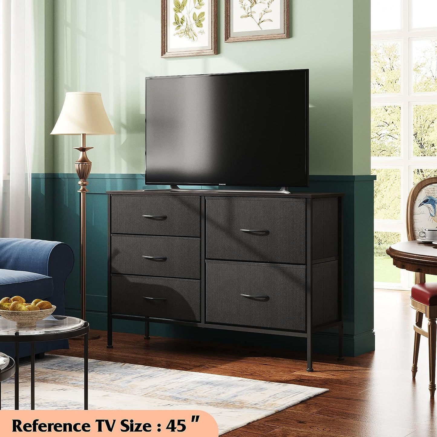 Dresser with 5 Drawers for Bedroom | Redesigned Black from AHF Depot - Black 5 drawer dresser in a modern bedroom setting against a green wall with a tv on the dresser.
